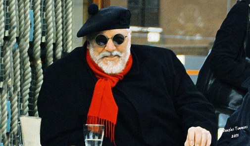 Scottish artist Calum Matheson enjoying a coffee and water in Glasgow's West End